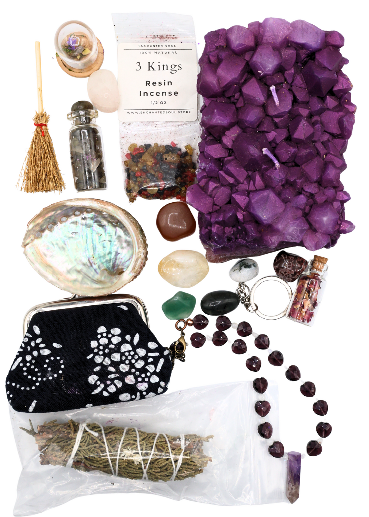 $75 Witchy Mystery Blind Box example contents with purple crystal candle, gemstones, incense, mini broom, jewelry and witchy gifts