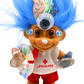 Close-up of Captain All-Seeing crystal troll doll with large third eye, blue hair, lifeguard outfit and abalone shell