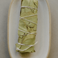 eucalyptus smudge stick on ceramic plate