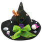 eyeball witch hat decorated by Tracie with decorative eyeballs, a bright green bow, a peacock feather, glittery bats and miniature book accents