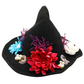 flower witch hat decorated by Tracie with colorful faux flowers, purple glitter branches, pearl-like beads, crystal accents and miniature keys