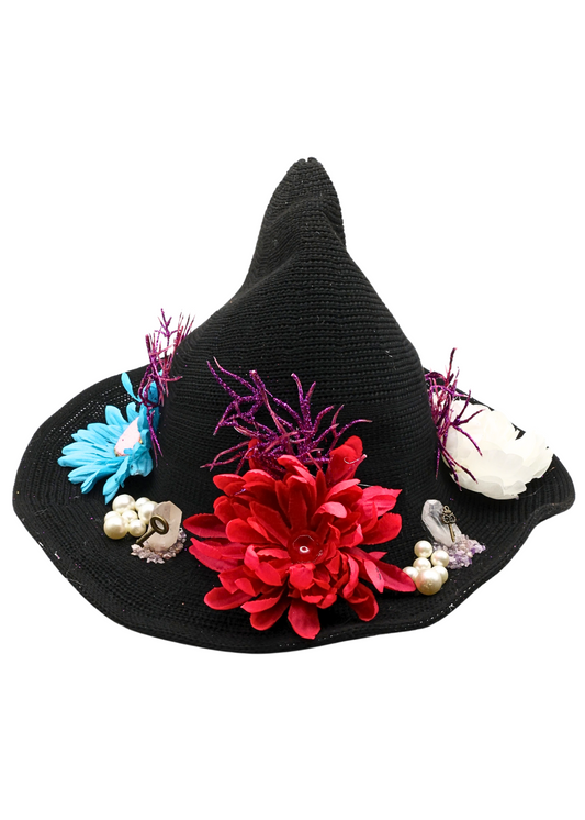 flower witch hat decorated by Tracie with colorful faux flowers, purple glitter branches, pearl-like beads, crystal accents and miniature keys