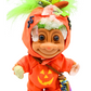 Close front view of Hexley crystal troll sculpture wearing orange jack-o-lantern outfit with quartz crystal accents