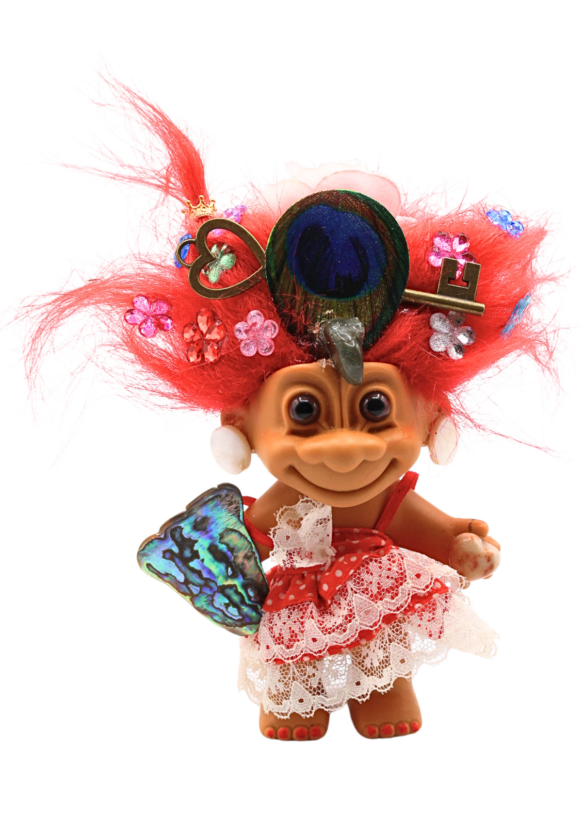 Lady Seraphina one-of-a-kind crystal guardian troll sculpture front view with red hair, peacock feather, red polka dot dress and iridescent wing