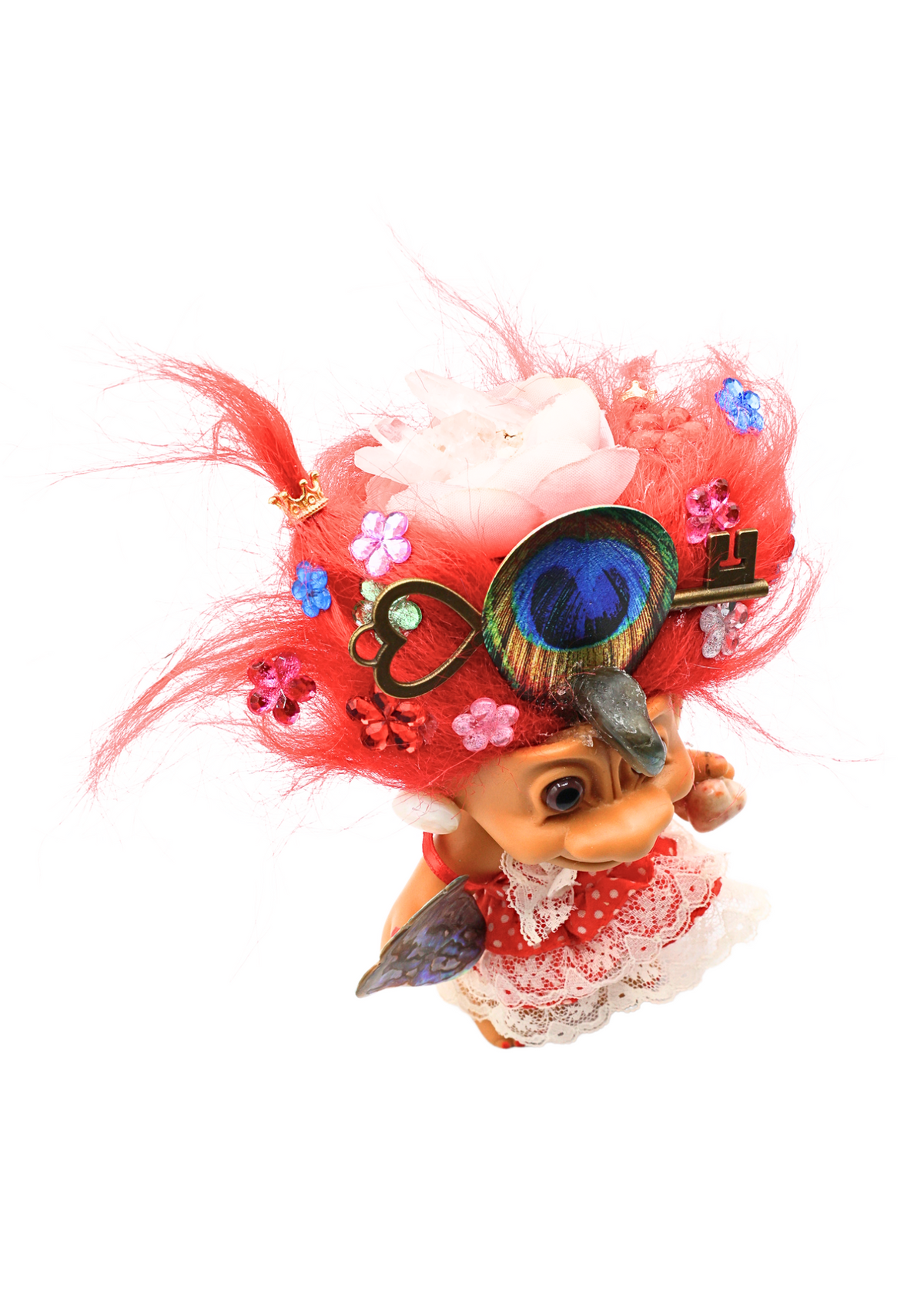 Lady Seraphina crystal troll sculpture angled side view showing rose, peacock feather and antique key