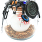 Close-up of Large Protection Spell Jar featuring black wax seal, blue eyeball charm and dried herbs