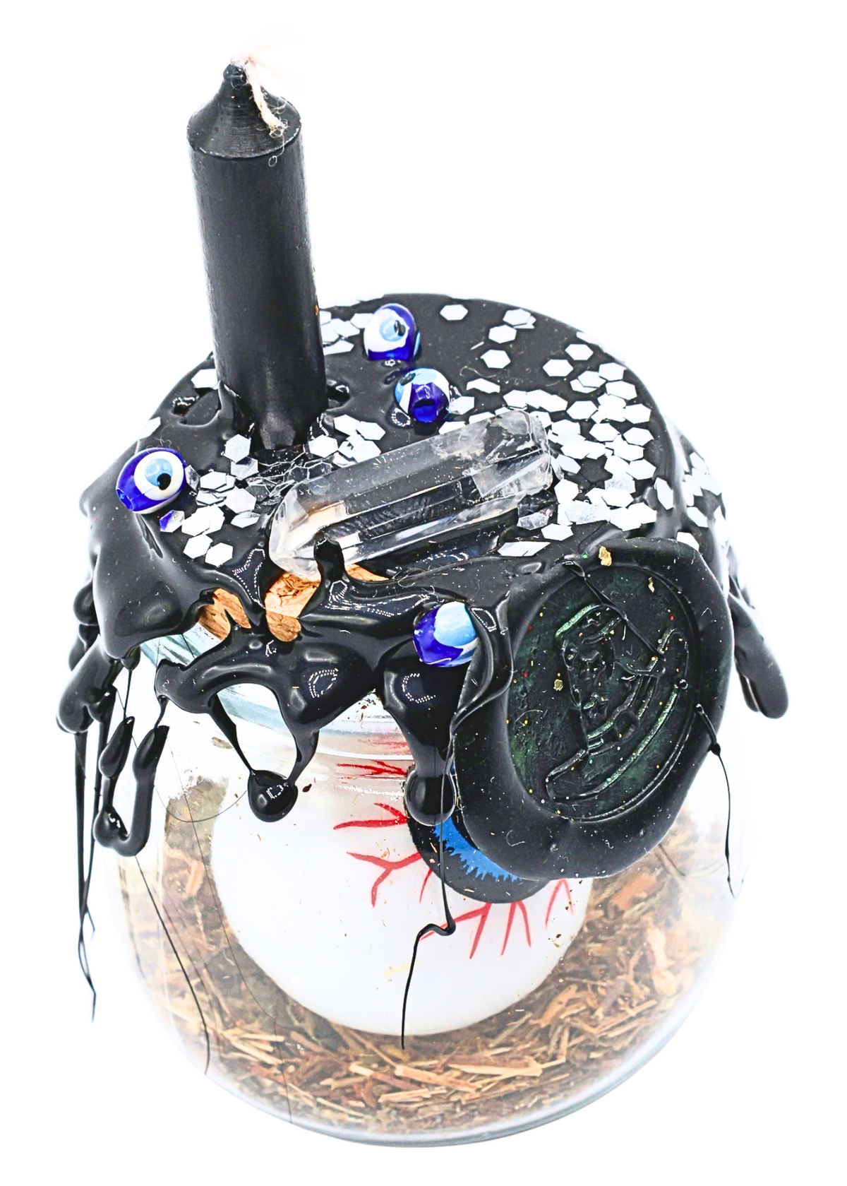 Top angled view of Large Protection Spell Jar showing quartz point, blue evil eye beads and black wax detailing