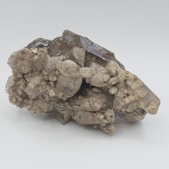 Smoky Quartz Crystal Cluster with Natural Sand Matrix video