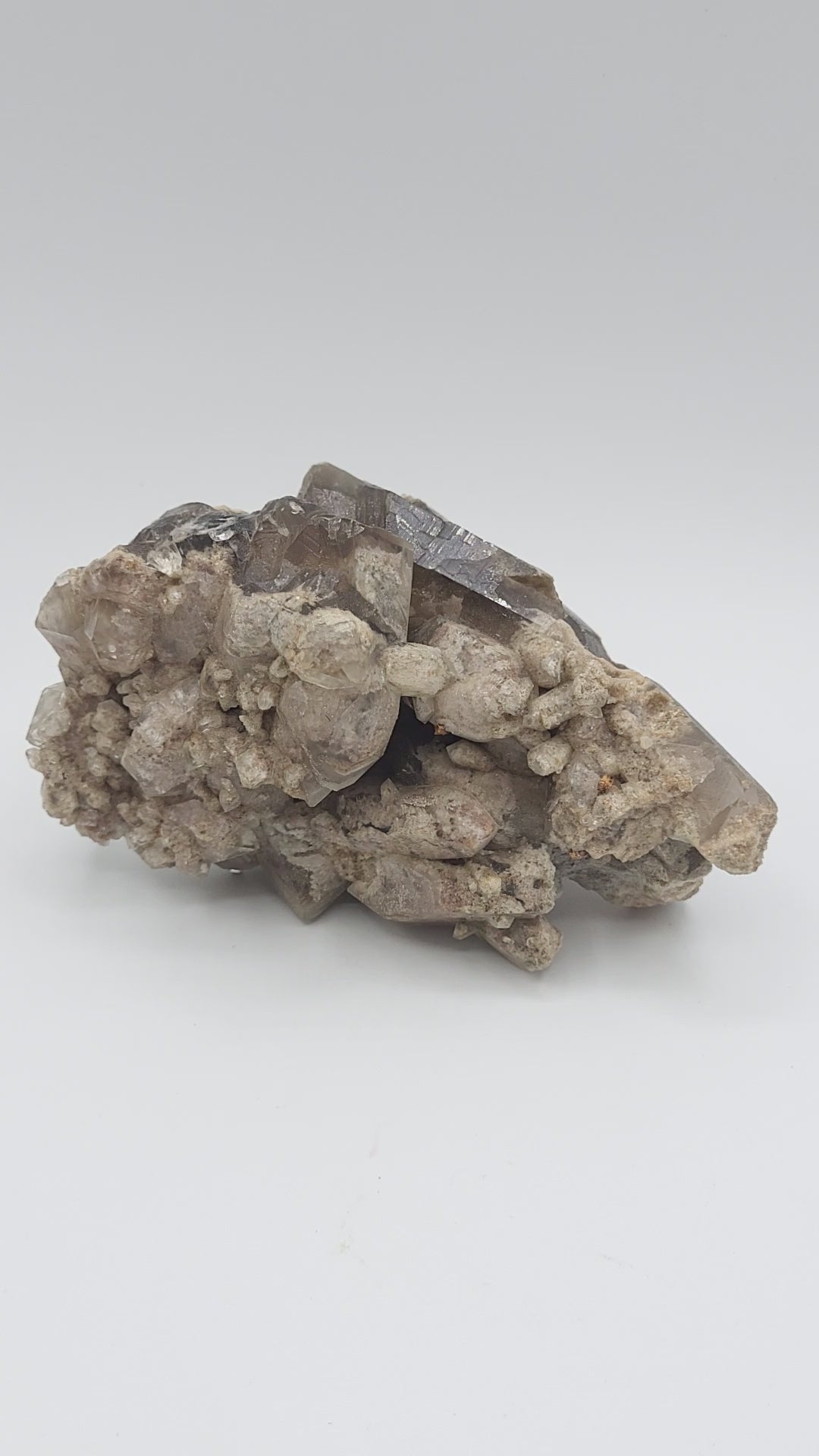 Smoky Quartz Crystal Cluster with Natural Sand Matrix video