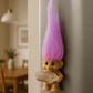 troll doll magnet with crystal on refrigerator