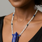 woman wearng lapis point beaded necklace