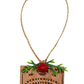 Wooden Ouija board holiday ornament with red bead and green sprigs, front view