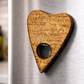 Small Planchette Wooden Magnet on refrigerator